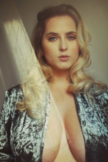 busty model Mollie Strunk photographed by photographer Tim Goodwin